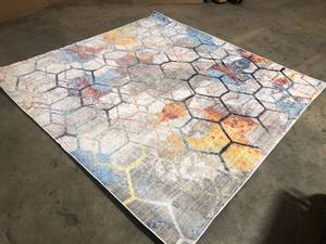 lot 29 image: White 8 ft. x 8 ft. Rainbow Area Rug by Unique Loom  Customer Returns See Pictures