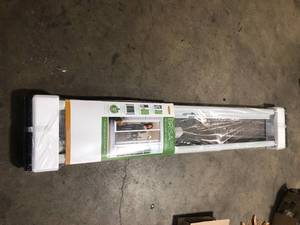 lot 34 image: Weather Star 80 in. Brisa White Retractable Screen Door for Sliding Door  Customer Returns See Pictures