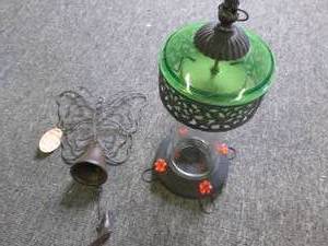 lot 11 image: hummingbird feeder and butterfly be...
