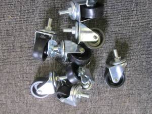 lot 60 image: 8- 2 inch locking swivel wheels ...