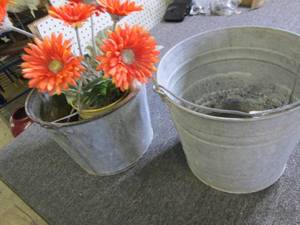 lot 67 image: 2 galvanized buckets with artificia...