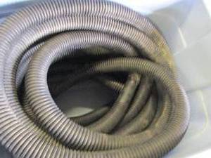 lot 87 image: 2 rolls of sump pump hose and totes...