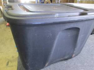 lot 93 image: 2 rolls of sump pump hose in a tote...
