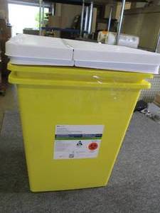 lot 214 image: 2 yellow trash cans with lids chemo...