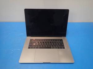 lot 8 image: Apple&nbspMacBookPro14,3 A1707 MPTR2LLA &nbspINTEL(R) CORE(TM) I7-7700HQ CPU  2.80GHZ  16GB LPDDR3 SDRAM  251GB HD  15.0 screen with 3360 x 2100 2K Resolution  Includes IOS  No charger ($400 reserve)