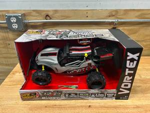 lot 36 image: New Bright 114 RC Full Function USB Buggy - Vortex Silver