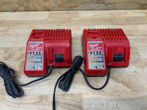 lot 76 image: MILWAUKEE Lot of 2-  M12 and M18 12-Volt18-Volt Lithium-Ion Multi-Voltage Battery Chargers