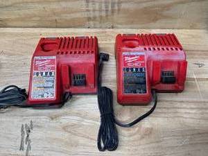 lot 77 image: MILWAUKEE Lot of 2-  M12 and M18 12-Volt18-Volt Lithium-Ion Multi-Voltage Battery Chargers