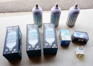 lot 27 image: (6) 5000 High Lumen LED Light Bulbs for Area Lights, Medium Base E26 Sockets, Barn Lights