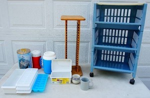 lot 65 image: Plastic Rolling Storage Bin, Ice Cube Trays, Water Jugs, CD Tower...