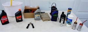 lot 79 image: Oil, Grease, Grease Cans, 12 Ton Bottle Jack, Tow StrapsWinch...