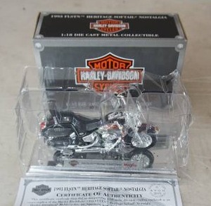 lot 118 image: Harley-Davidson 118 scale 1993 FLSTN TM HERITAGE SOFTAIL NOSTALGIA  AvonMaisto w Box & COA