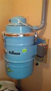 Pullman Central Vacuum with hose and attachments.