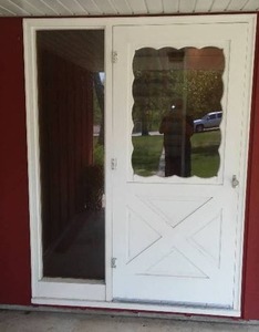 36 in. Front Entry Door with Storm Door and Side Light.