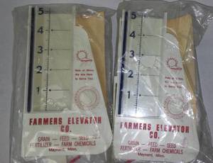 lot 389 image: Rain Gauges farmers Elevator Co. New old Stock