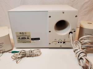 lot 107 image: Altec Lansing ACS45.1 Subwoofer & 2 Speakers, excellent condition. This is a vintage set that is HIGHLY SOUGHT AFTER due to the superior sound of the booming subwoofer.