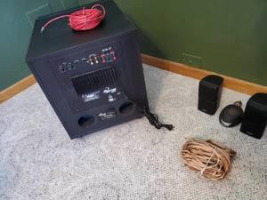 lot 108 image: Two Bose Double Cube Corner Speakers, a Pioneer Center Speaker & Dayton 15 Subwoofer with pleanty of wires to complete your home theater.