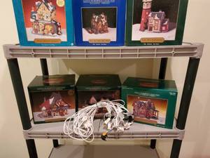 lot 124 image: Lot #3 Christmas, Antiques , Santas Workbench Collection-Classic Series. All buildings in boxes with light attachments, as shown.