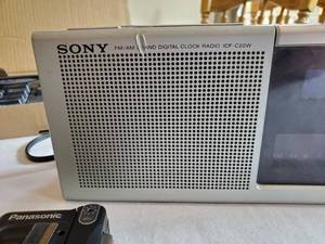 lot 165 image: 3 Mini Cassette Players, Watchman TV, Sony Radio, etc. All power on, Cassettes work, Radio works great, but dial not illuminated.