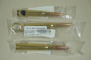 lot 30 image: Lucky Shot 50 Cal BMG Bottle Opener, Corkscrew, and Tap Handle