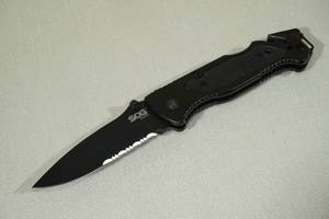 lot 34 image: SOG Escape Tactical Folding Knife- 3.4 Inch Serrated Edge Blade