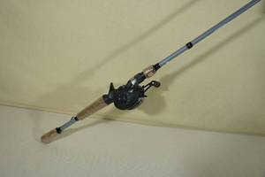 lot 128 image: Ozark Trail OTX 6 8 Baitcaster Rod and Reel Combo