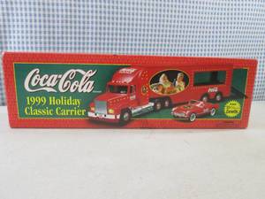 lot 67 image: (EW4) Coca-Cola 1999 Holiday Classi...