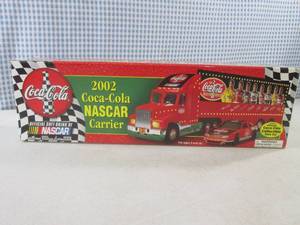 lot 69 image: (EW4) Coca-Cola 2002 Nascar Carrier...