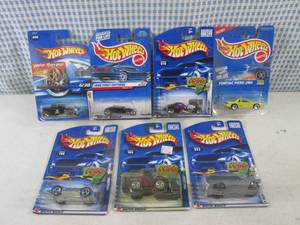 lot 265 image: (EC1) Assorted Hot Wheels in Packag...