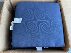 lot 146 image: Lot of Four Hampton Bay 21 in. x 21 in. x 3.5 in. Sail Blue Contoured Outdoor Seat Cushions