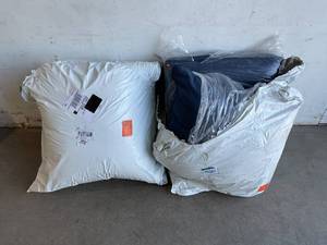 lot 147 image: Lot of Two 1101Design 25 x 25 Deep Seating Outdoor Pillow and Cushion Sets in Sunbrella Spectrum Indigo