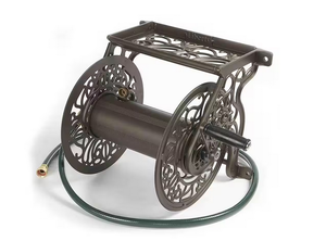 lot 62 image: Liberty Garden Model 704 Decorative Outdoor Garden Water Hose Reels
