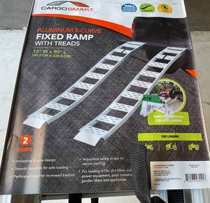 lot 150 image: CargoSmart Set of Two 12 in. W x 90 in. L 1500 lb. Capacity Aluminum Fixed S-Curve Truck Loading Ramp with Treads