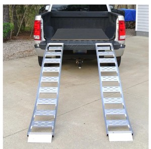 lot 151 image: CargoSmart Set of Two 12 in. W x 90 in. L 1500 lb. Capacity Aluminum Fixed S-Curve Truck Loading Ramp with Treads