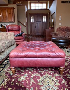 lot 11 image: Large Leather Tufted Ottoman