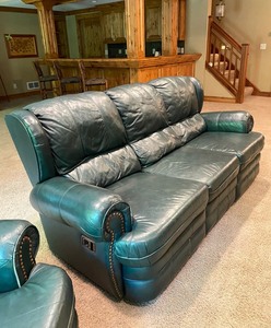 lot 23 image: Leather Green Sofa