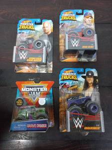 lot 39 image: Four Packs Of Hot Wheels Monster Trucks