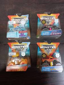 lot 44 image: Four Packs Of Hot Wheels Monster Trucks