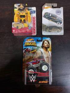 lot 51 image: Two Packs Of Hot Wheels And A Pack Of Hasbro Transformers