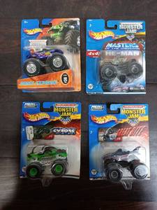 lot 58 image: Four Packs Of Hot Wheels Monster Trucks
