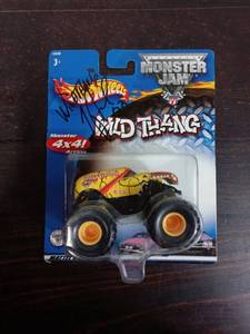 lot 60 image: Signed Pack Of Hot Wheels Monster Jam Wild Thang