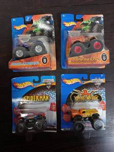lot 62 image: Four Packs Of Hot Wheels Monster Trucks
