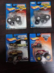lot 64 image: Four Packs Of Hot Wheels Monster Trucks