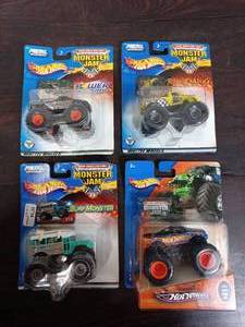 lot 65 image: Four Packs Of Hot Wheels Monster Trucks