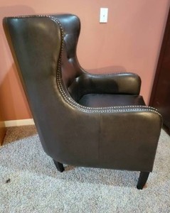 lot 19 image: Dapper Emerald Tacked Leather Armchair