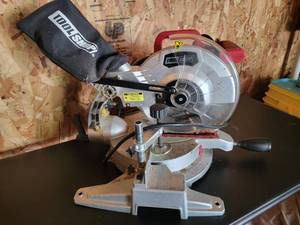 lot 110 image: Tool Shop 10 15Amp Compound Miter Saw 240-2081