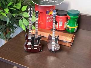 lot 1147 image: Axe Heaven Gibson SG Miniature Guitar Set GG-220 2-piece