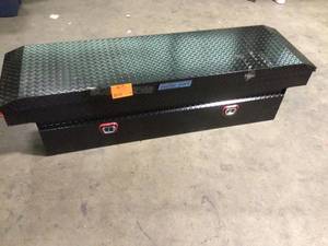 lot 34 image: Weather Guard 72 in. Gloss Black Aluminum Full Size Crossbed Truck Tool Box  Customer Returns See Pictures