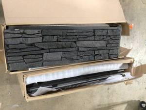 lot 48 image: GenStone Stacked Stone Iron Ore 12 in. x 42 in. Faux Stone Siding Panel Customer Returns See Pictures