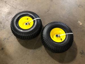 lot 19 image: 2 Lots of Arnold 15 in. x 6 in. Front Wheel Assembly with Turf Saver Tread for John Deere Riding Lawn Mowers Customer Returns See Pictures